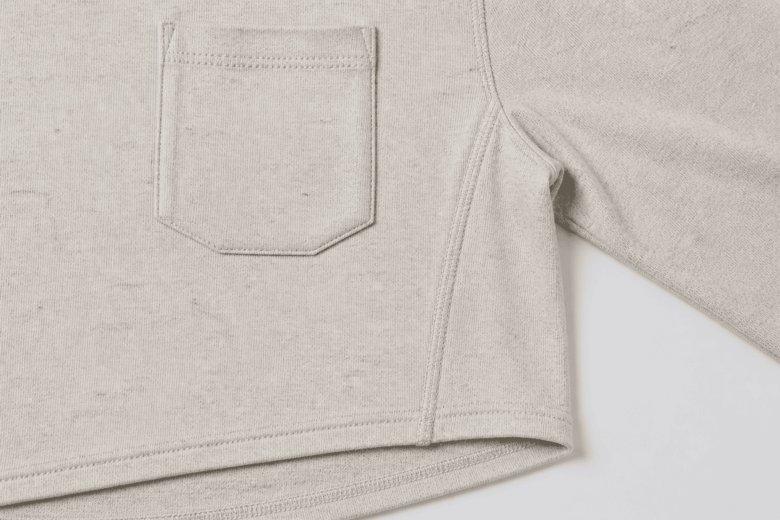 Left-chest pocket and flatlock seam detail